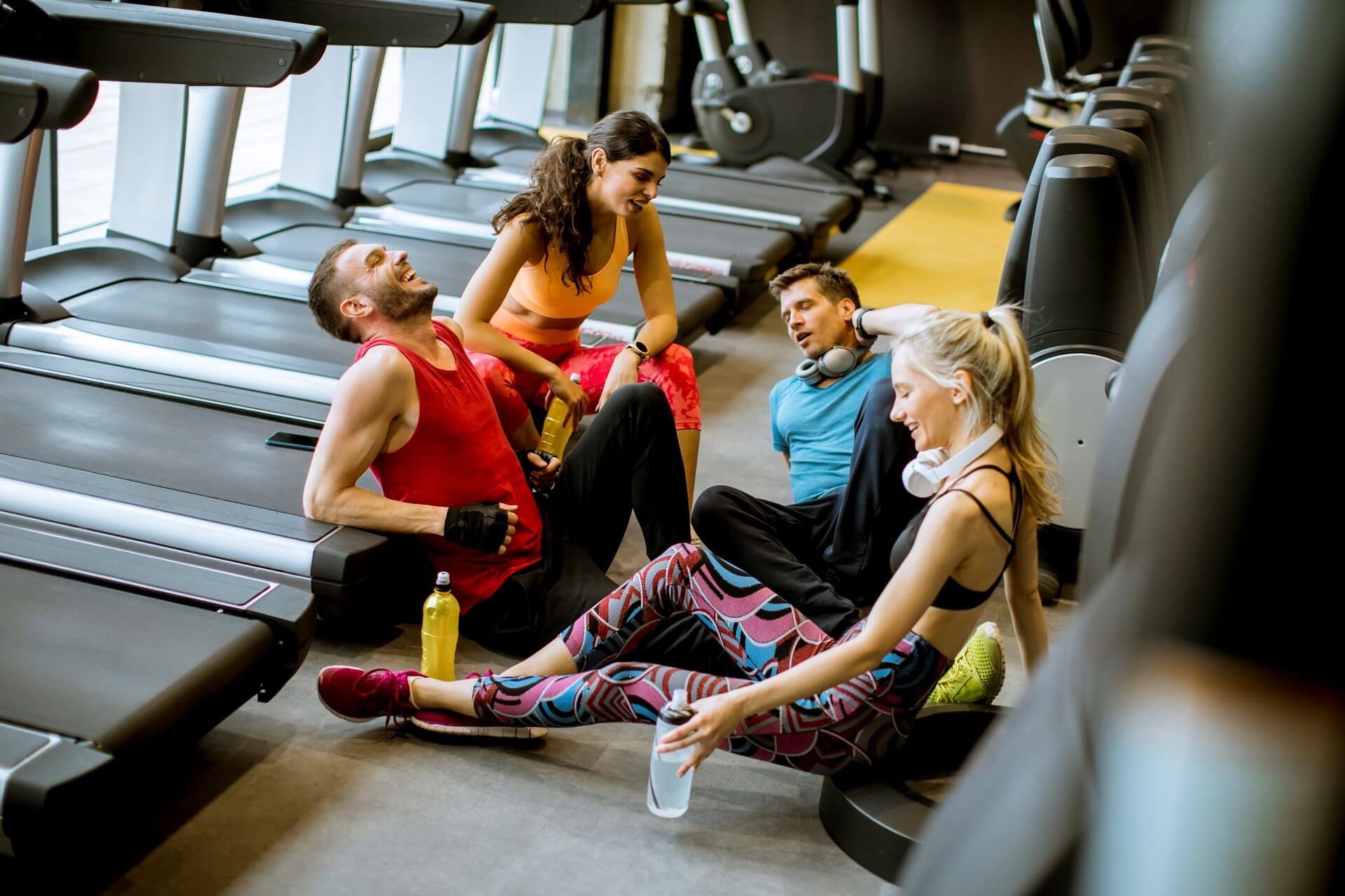 young-people-in-sportswear-talking-and-laughing-to-2023-11-27-05-17-05-utc.jpg